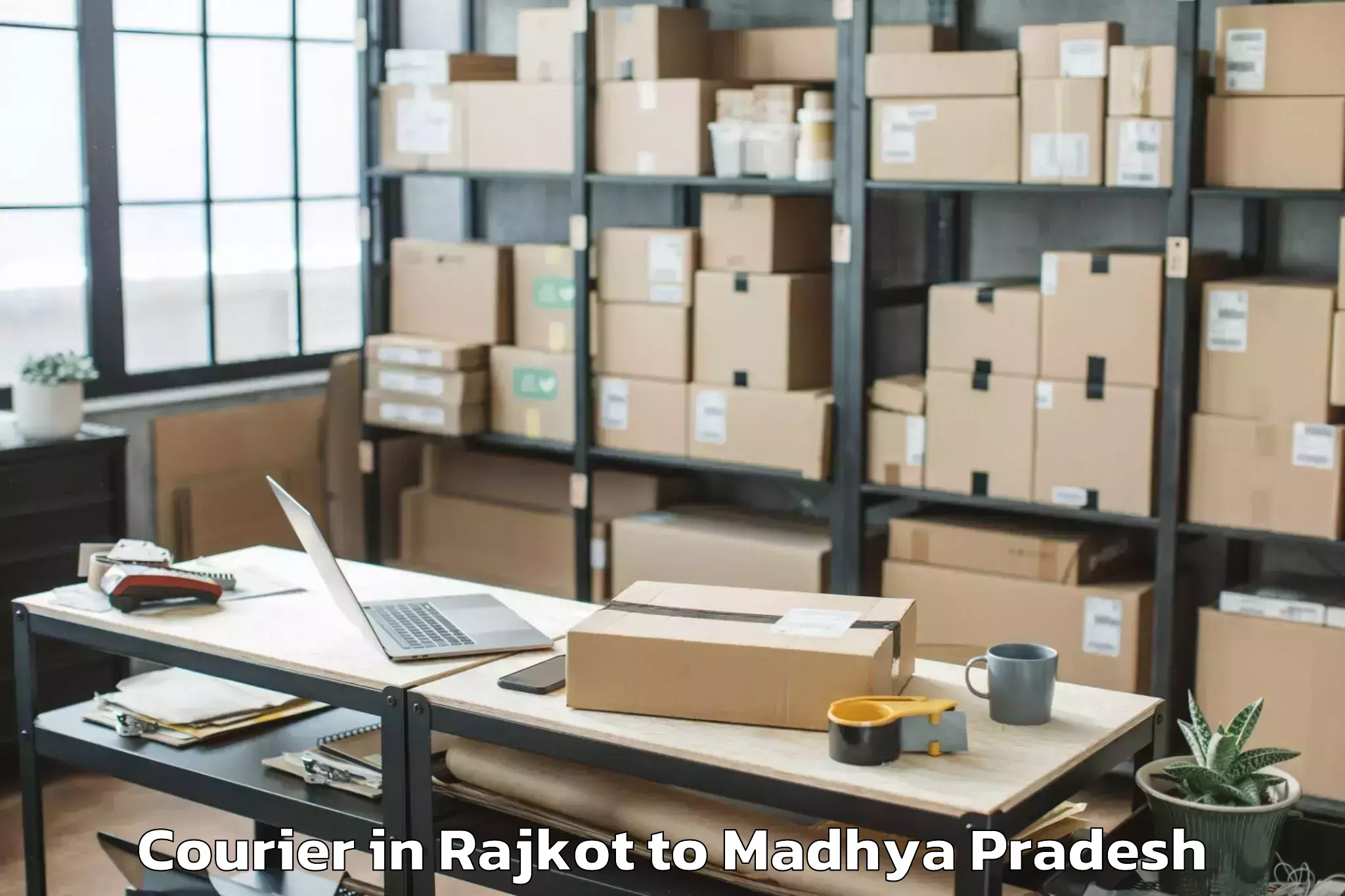 Get Rajkot to Khaknar Kalan Courier